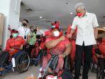 ganjar-dan-atlet-penyandang-disabilitas-jateng-itu-menggema-di-terminal.jpg
