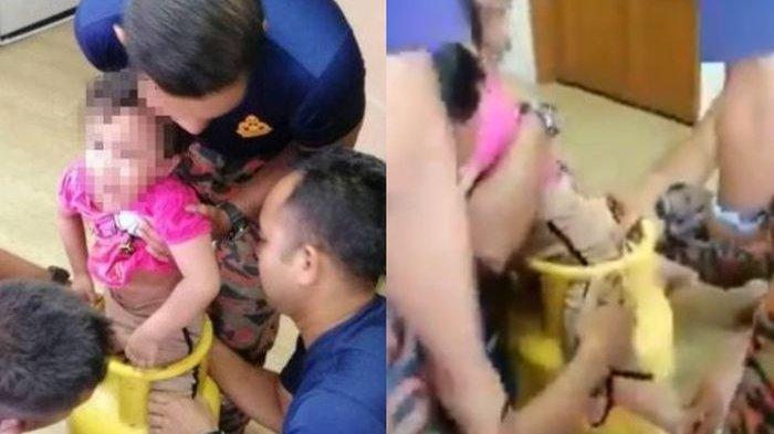 VIRAL VIDEO Bocah 3 Tahun Menangis Saat Kedua Kakinya Tersangkut Pada Tabung Gas