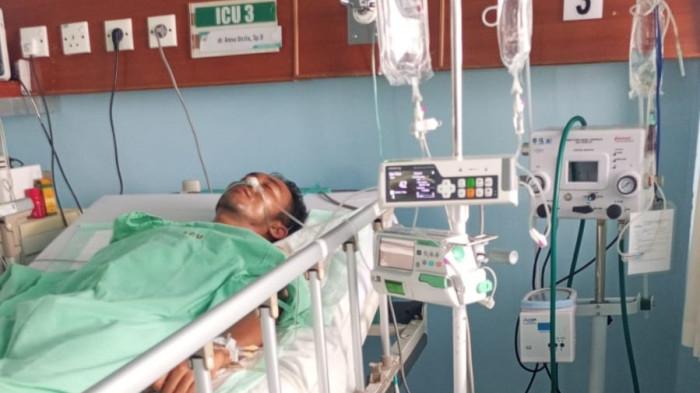 DRIVER OJOL DI BATAM KORBAN PENIKAMAN - Muliadi (32), driver ojek online di Batam korban penikaman masih terbaring lemah di ruang ICU RS Budi Kemuliaan (RSBK), Kota Batam, Provinsi Kepulauan Riau (Kepri), Kamis (30/4/2026). Ia sudah sadar setelah sempat koma akibat luka tusuk pada bagian perut.