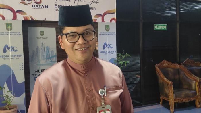 HARI PERTAMA WFH ASN - Kepala Dinas Komunikasi dan Informasi (Diskominfo) Kota Batam Rudi Panjaitan, saat memberikan komentar mengenai hari pertama WFH ASN Pemko Batam, Jumat (24/4/2026).