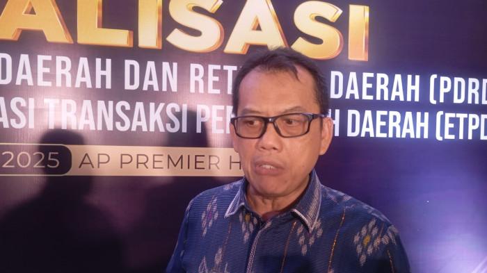 Kepala Bapenda Kota Batam Raja Azmansyah, saat Sosialisasi PDRD dan Elektronifikasi Transaksi Pemerintah Daerah (ETPD) di Hotel AP Premier Batam, Jumat (5/12/2025)