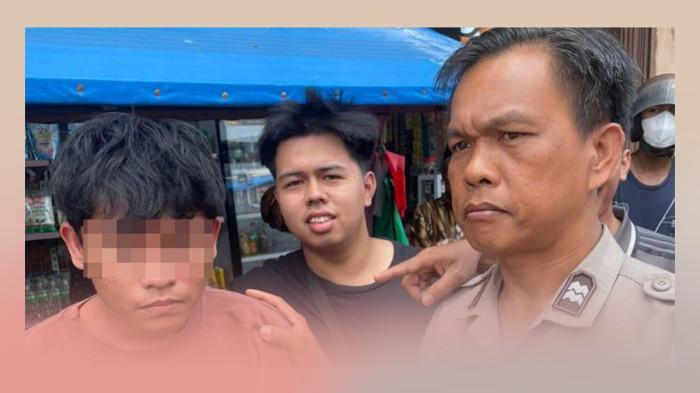 TERDUGA PELAKU - Terduga pelaku pencurian sepeda motor ((kiri) ) di Batam yang diamankan warga di daerah Batuaji, saat hendak dibawa anggota Polsek Batuaji, Senin (23/3/2026).