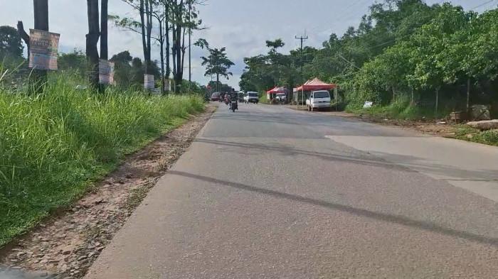 KECELAKAAN MAUT DI BATAM - Kondisi terkini lokasi kecelakaan lalulintas di Simpang Bagan, Pintu 4 Mukakuning, Kecamatan Sei Beduk, Kota Batam, Provinsi Kepulauan Riau (Kepri) yang menewaskan driver online dan ibunya saat berangkat kerja, Minggu (17/5/2026).