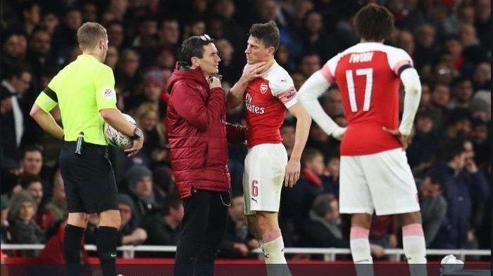 Tertendang Romelu Lukaku, Rahang Kapten Arsenal Laurent Koscielny Patah, Darahnya Bercucuran