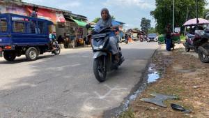 Garis-putih-isyarat-Ahmad-tewas-di-jalan-aspal-hasil-olah-TKP-Polantas-Barelang.jpg