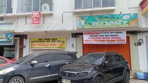Spanduk-penolakan-parkir-maganda.jpg