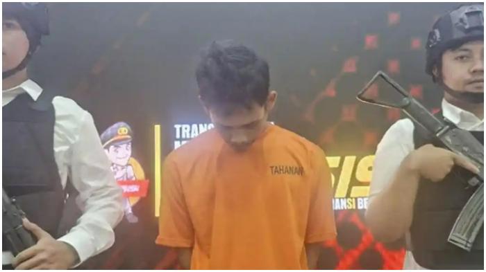 Nanang-27-tertunduk-malu-dan-menyesal-telah-membunuh-penjaga-konter-HP-di-Bandung.jpg