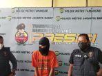 12072022_seorang-sopir-taksi-berinisial-cnt-karena-curi-uang-penumpang.jpg