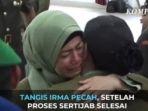 14102019_irma-nasution-istri-kolonel-hendi-suhendi-menangis.jpg