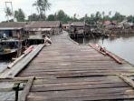 14112021jembatan-kayu-desa-tanjung-irat.jpg