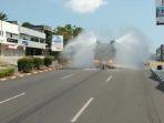 3103-water-cannon-sedang-menyemprot-disinfektan.jpg