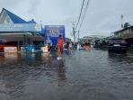 Banjir-Rob-di-jalan-RE-Martadinata-Tanjung-Uban.jpg