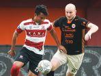 Duel-Madura-United-vs-Persija-Jakarta-di-pekan-ke-27-BRI-Liga-1-2022-2023.jpg