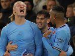 batam/Erling-Haaland-kiri-selebrasi-dengan-John-Stones-dan-Manuel-Akanji.jpg