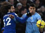 Marc-Cucurella-berebut-bola-dengan-Joao-Cancelo.jpg