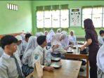 cabjari-moro-bagian-makan-siang-gratis.jpg
