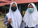 dua-siswi-di-bintan-ucapkan-hari-guru-nasional.jpg