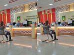 foto-yang-memperlihatkan-seorang-petugas-kantor-pemerintahan.jpg