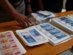 ilustrasi-uang-palsu_20160722_072525.jpg