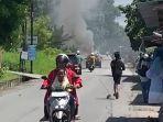 kepulan-asap-membakar-mobil.jpg
