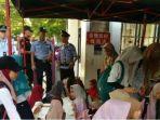 muslim-utsul-dikawal-polisi.jpg