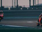 pebalap-repsol-honda-jorge-lorenzo-dan-marc-marquez-di-lintasan.jpg