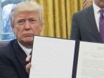 presiden-as-donald-trump-mengeluarkan-as-dari-kerjasama-trans-pasifik_20170124_090254.jpg