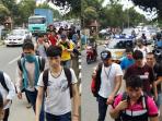 puluhan-imigran-asal-afganistan-saat-akan-di-berangkat-ke-jakarta_20160126_212918.jpg
