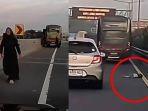 reaksi-orangtua-bocah-yang-jatuh-dari-bus-TNI-AD-di-Jalan-Tol-JORR.jpg