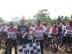 ribuan-peserta-sepeda-nusantara_20181007_101237.jpg