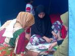 sejumlah-ibu-yang-menjadi-korban-longsor-perumahan-nusa-indah-tanjungpiayu_20160104_121455.jpg
