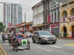 trishaw-uncle-berkeliling-di-singapura.jpg