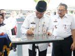wali-kota-tanjungpinang-tandatangan.jpg