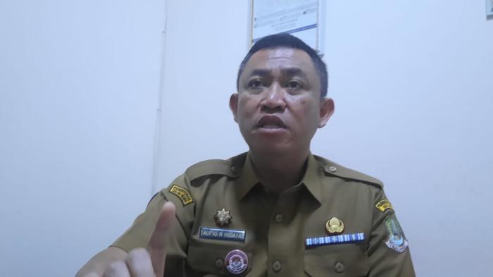 KEBAKARAN SPBE BEKASI - Kepala Disdukcapil (Kadisdukcapil) Kota Bekasi, Taufiq Rachmat Hidayat saat ditemui di kantor Dukcapil, Kecamatan Bekasi Timur, Selasa (20/1/2026). (TribunBekasi/RendyRutamaPutra).
