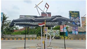 Patung-ikan-gabus-dipajang-di-Jalan-Raya-Gabus-Desa-Srijaya-Tambun-Utara-Bekasi.jpg