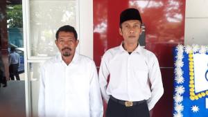Ratma-dan-Subani-seusai-dilantik-sebagai-ASN-di-Aula-Syekh-Quro-Unsika-Karawang.jpg