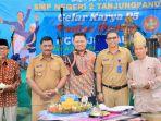 202030607-Bupati-Belitung-Sahani-Saleh-saat-menghadiri-Dies-Natalis-SMP-Negeri-2-Tanjungpandan.jpg