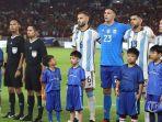 20230620-Cucu-Presiden-Joko-Widodo-jadi-player-escort-Kiper-Timnas-Argentina-Emiliano-Martinez.jpg