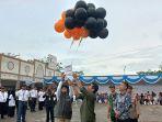 20231126-Pelepasan-balon-ke-udara-usai-kegiatan-Apel-Siaga-Pengawasan-Pemilu-Tahun-2024.jpg