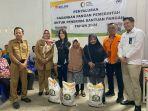 20240227_Penyerahan-bantuan-pangan-cadangan-beras.jpg