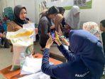 20240229_Penyaluran-bantuan-pangan-cadangan-beras-pemerintah.jpg