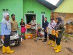 20241219-Penyerahan-bantuan-kepada-warga-terdampak-banjir-rob-di-Belitung-Timur.jpg