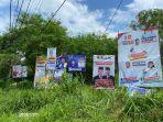 Ilustrasi-pemasangan-spanduk-sebagai-media-kampanye-para-calon-legislatif-di-sepanjang-jalan.jpg