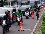jalur-sepeda-penguna-sepeda-melintas-di-jalur-sepada-di-jalan-sudirman.jpg