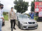 mobil-bmw-yang-terparkir-lebih-dari-setahun-di-bandara-soekarno-hatta.jpg