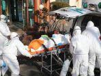 para-pekerja-medis-dilengkapi-pakaian-pelindung.jpg