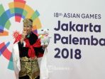 pesilat-indonesia-sugianto-pada-upacara-pengalungan-medali_20180830_232317.jpg
