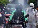 semprot-disinfektan-puluhan-ojek-online-ojol.jpg