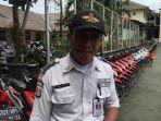 slamet-satpam-viral-karena-menyusun-motor-sesuai-dengan-merk-dan-warnanya.jpg