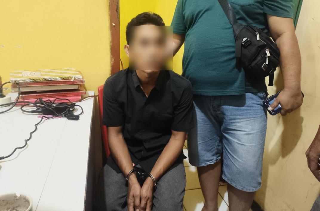 Pelaku-HE-ditangkap-polsek-teluk.jpg